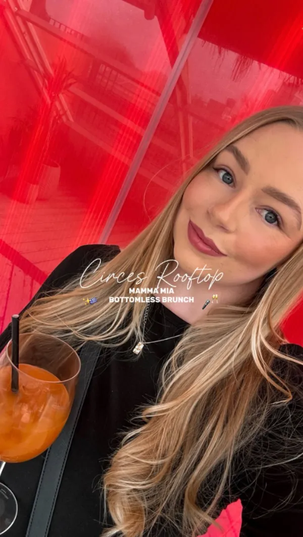 The video showcases Circe's Rooftop Mamma Mia Bottomless Brunch. It features the rooftop venue, including its decor and views. Food and drinks shown include prosecco, fruity cocktails, fries, Greek food (pitas with toppings), and cake. The presentation emphasizes the lively atmosphere with singing and dancing. The main focus is on the immersive entertainment and the bottomless brunch experience.