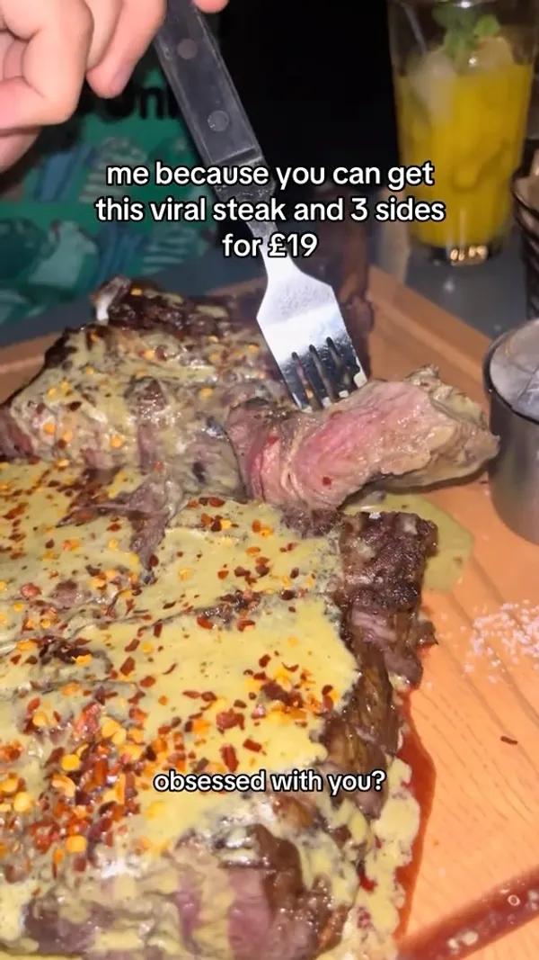 The video showcases a meal at Swiss Butter in Holborn, London, highlighting their viral £19 steak and their Tomahawk steak. It shows various dishes including the Tomahawk steak with fries and salad, a salmon steak, and desserts such as molten chocolate cake and pain perdu.  The presentation focuses on close-ups of the food and drink, emphasizing their textures and colors.  The video also mentions that the restaurant is Halal and that there is often a queue. 