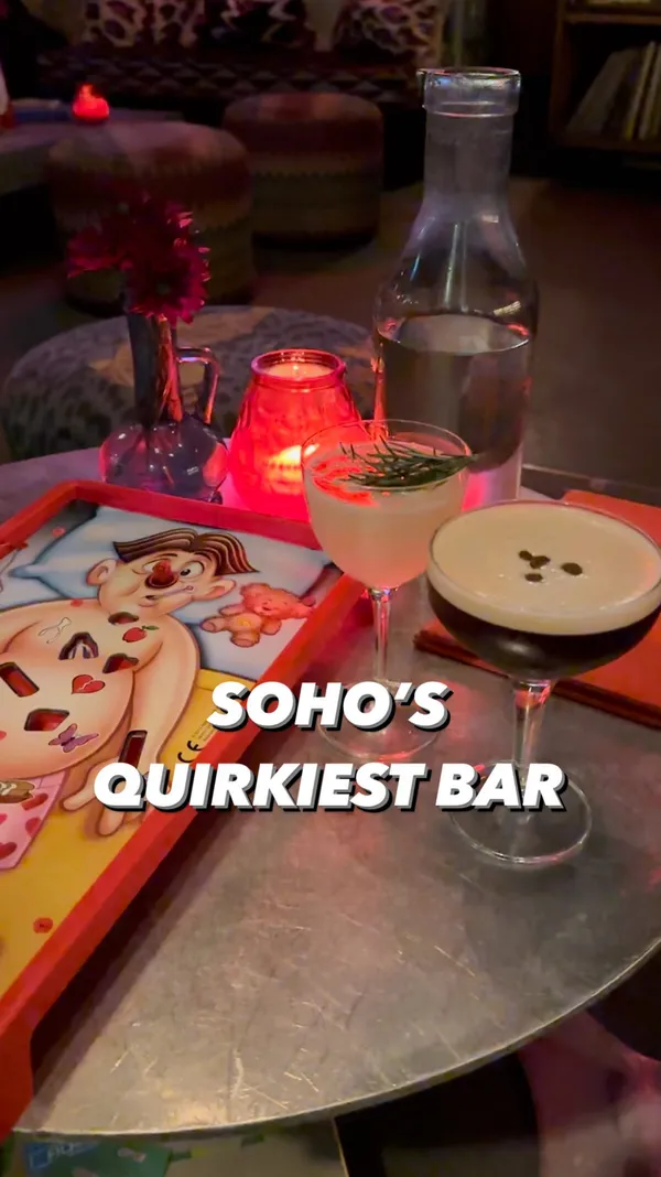 The video showcases The Little Scarlet Door, a bar in London. It features various areas of the bar, including a cocktail area, a shower-themed room, and several seating areas decorated with eclectic art and decor. The video highlights unique cocktails presented in elegant glasses. The primary focus is showcasing the bar's quirky and homey atmosphere.
