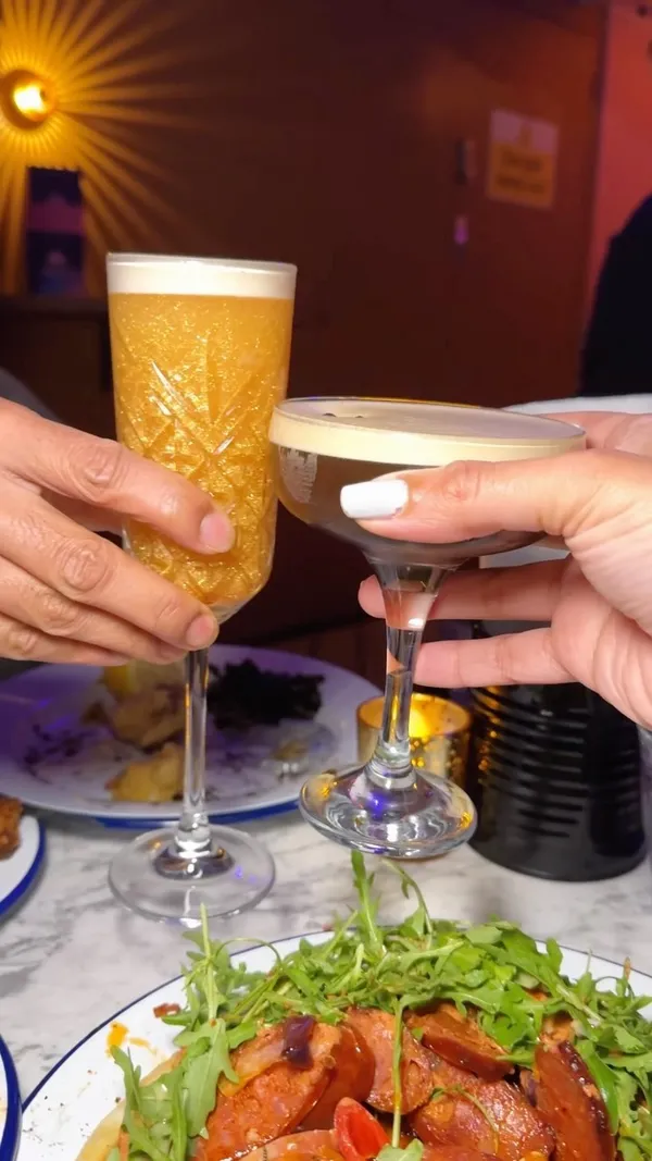 Step into Circe’s rooftop bar and transport yourself to a mythological paradise 🌞✨ Named after the legendary goddess Circe, this rooftop offers a haven of escapism, where cocktails are magical and the vibes are unforgettable. 🧙🏽‍♀️ If you’re looking for a reason to visit, their “Witching Hour” is every Mon-Thurs, 5-7pm, where you can enjoy 3 for 2 on small plates and 2 for 1 on cocktails! Perfect for a midweek escape!✨

Here’s what we had: 
🍕 Chorizo Flat Bread - £9.5 ⭐
🦑 Nori Dusted Calamari - £12.5 ⭐
🦐 Chilli Garlic Prawns - £12.5 ⭐
🍗 Sage & Onion Crusted Chicken Strips - £9.5

Cocktails: 
💋 Aphrodite’s Kiss - £13.95 ⭐
👑 Midas Touch - £13.95
☕ Grey Goose Espresso Martini - £13.95 ⭐
🌶️ Perse’s Picante - £13.50

⭐= My highlights

The cocktails here are enchanting, with fun twists that make them as visually stunning as they are delicious. I’d say Aphrodite’s Kiss was my favorite - fruity, refreshing, and just the right amount of sweet. 💋✨🥂

The food plates are filling, great for sharing, and packed with flavor. The Chilli Garlic Prawns were hands down the standout, with a perfectly garlicky sauce that was amazing to soak up with the bread. The calamari was tender, dusted with nori, and paired with fresh wakame - a great twist on a classic! The chorizo flatbread was the ideal accompaniment, and the chicken strips were crispy and flavorful with that sage and onion crust.

If you’re craving a rooftop with a view, unique cocktails, and delicious bites to match, Circe’s is the perfect spot! 🌆

📍117 Waterloo Rd, London SE1 8UL

{invite} Thank you for having me @circes_rooftop 🌞

#cocktailbarlondon #rooftopbarlondon #happyhourlondon #londondatespots #londonfoodblogger #londoncontentcreator