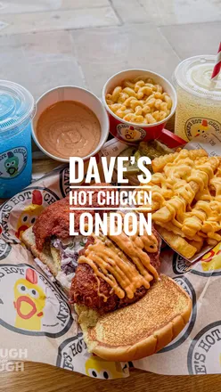 Dave's Hot Chicken in London featuring sliders, tenders, cheesy fries, and a spicy meal experience.