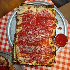 Delicious marinara round pizza with crispy base, served at Subrosa, a new pizza spot in Castlemilk, Glasgow.
