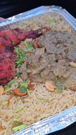 Delicious chicken and juicy lamb dish at House of Mandi & Desserts in Luton, with flavorful rice and enjoyable chai.