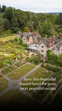 Gravetye Manor in Sussex: a scenic countryside retreat with stunning gardens and a Michelin star restaurant.