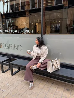 Fashionable autumn outfit featuring a Zara jacket and Adidas trainers, perfect for cozy September vibes in Leeds.
