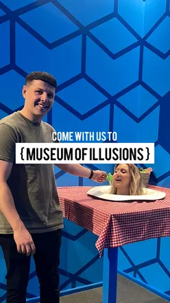 Visitors enjoying illusions at the Museum of Illusions in Manchester, featuring fun and captivating exhibits.