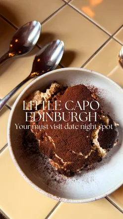 Cozy interior of Little Capo in Edinburgh, featuring zucchini frites and special lasagne for a perfect autumn date night.