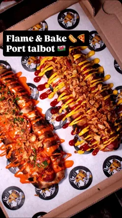 Delicious feast at Flame & Bake in Port Talbot, featuring mouthwatering pizza and gourmet hot dogs.