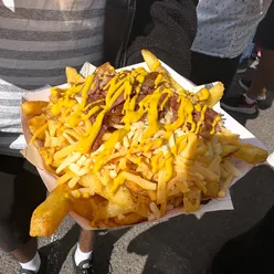 Bacon and cheese loaded fries with mustard at Gut Buster Food Bar, Big Olney Food Festival.
