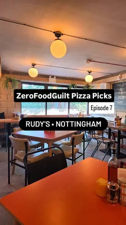 Delicious Neapolitan pizza at Rudy's West Bridgford with vibrant toppings and a sweet tiramisu dessert.