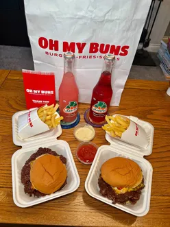 Delicious smashed burgers and crispy beef tallow fries at Oh My Buns in Barrhead, paired with tempting milkshakes.