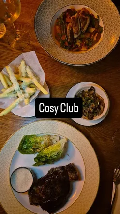 Friends enjoying drinks and starters at the newly refurbished Cosy Club in Leeds, perfect for cosy season dining.