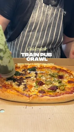 Group enjoying a fun pub crawl just outside Manchester with craft beer and lively atmosphere.