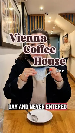 Cozy autumn scene with a Fiaker coffee at Vienna Coffee, perfect for chilly days in Manchester.