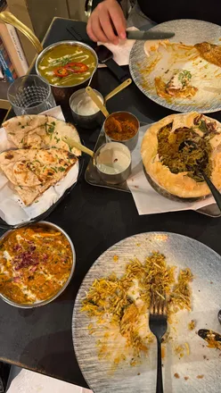 Delicious chicken biryani and vibrant dishes at Black Cumin, Cotham Hill in Bristol - a food lover's paradise!