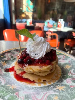 Delicious gluten-free and dairy-free meals including pancakes, cookie pies, tacos, and more from various restaurants.