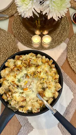 Hearty one-pot chicken and vegetable pie topped with sourdough croutons and mozzarella, perfect for autumn comfort.