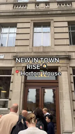 Brunch enthusiasts enjoying a lively atmosphere at the bustling new brunch spot in town.