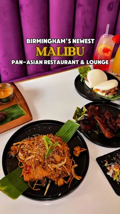 Delicious Pan-Asian dishes at Malibu in Birmingham, featuring sushi, bao buns, and refreshing mojitos in a vibrant setting.