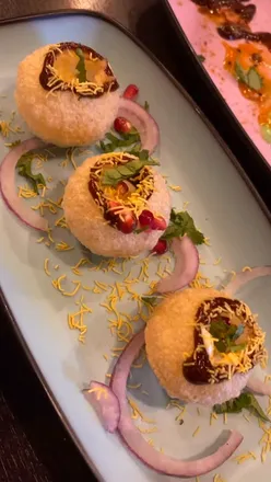 Delicious Indian tapas at Nana's in Northowram, featuring chaat bombs, bhajis, curries, and flavorful sides.