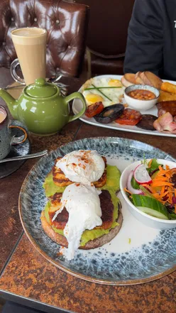 Delicious brunch at Angelica Cafe Bistro in Brighouse: Avo on toast, Full English breakfast, and cozy decor.