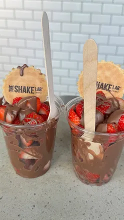 Strawberry Chocolate Cups at The Shake Lab in Oxford offer a perfect blend of fresh strawberries and rich chocolate.