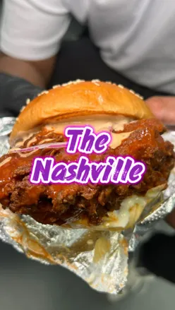 Delicious Cayenne Nashville Burger and loaded fries at Griller Kitchens, Birmingham. A flavor-packed meal for burger lovers!