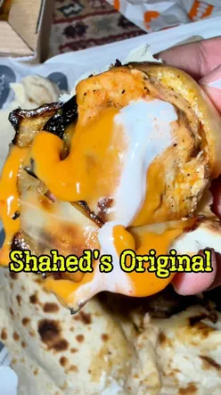 “Delicious healthy takeaway from Shahed’s Original on Pollockshaws Rd, featuring loaded waffle fries and kebabs.”