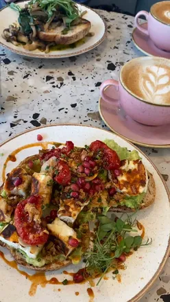 Brunch at Hatch Brunch House in Halifax featuring halloumi avocado toast and wild mushrooms on toast with chai lattes.