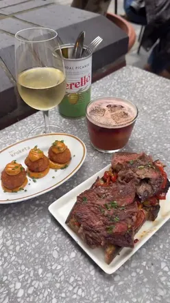Delicious tapas, txuleta, and cocktails at Bar Kroketa, celebrating Spanish cuisine in London. #EatSpainDrinkSpain