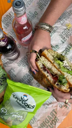 Delicious lunch from @thetradingroute in Manchester: chicken focaccia, charcuterie sandwich, crisps, and drink for £10.