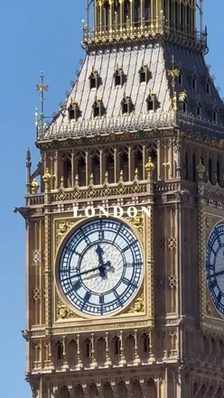 Couple enjoying a scenic moment near Big Ben in Westminster, London, with #VisitLondon vibes.