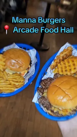 Delicious spicy smash burger, waffle fries, and creamy vanilla milkshake at Manna Burgers, Battersea Power Station party.