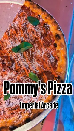 Artisan pizza from Pommy's Pizza in Brighton, showcasing unique flavors and collaborations with local chefs.