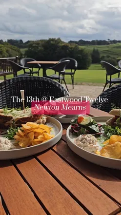 Delicious lunch at @eastwoodtwelve: mozzarella focaccia, hot honey chicken sandwich, and soup of the day with a view.