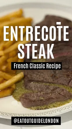 Classic French Entrecôte steak served with golden fries and buttery herb sauce, embodying bistro culture.