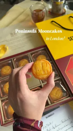Delicious Peninsula custard mooncakes displayed at Selfridges, celebrating the Mid-Autumn Festival in London.