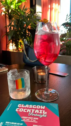 Guests enjoying cocktails at the launch of Glasgow Cocktail Fortnight at Sisi, a trendy Glasgow venue.