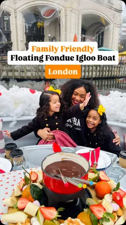 Families enjoying floating fondue adventure in private igloos on Skuna Boats in Canary Wharf, East London.