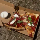 Delicious food crawl in London featuring pizza, cookies, mangonada, and birthday celebrations with friends.
