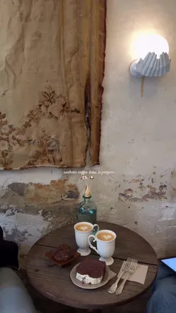 Aesthetic café in Paris with cozy vibes and beautiful decor, perfect for coffee dates and Instagram moments.