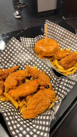 Delicious burger and wings feast box from Chicky’s Scotland, featuring massive tenders, fries, dips, and drinks.