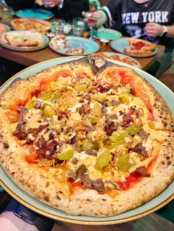 Three-course meal for £9.95 at Scott and Wilson Bar, featuring unique Neapolitan pizzas and delicious desserts.