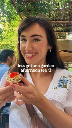 Afternoon tea at Petersham Nurseries with vegan and gluten-free options, surrounded by nature and fresh flowers.