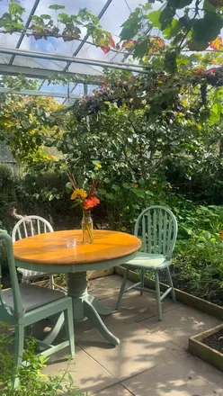 Stunning seasonal plates and gifts at The Secret Herb Garden, showcasing handcrafted gins and beautiful surroundings.