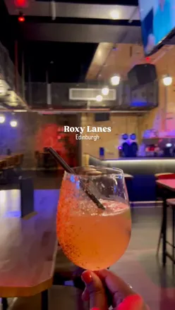 Couples enjoying bowling and cocktails at Roxy Lane, the ultimate date night spot in Edinburgh.