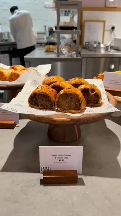 Coffee and cinnamon buns at Dinner Ladies takeover at Abbots Kitchen, St Albans Cathedral, perfect for a quiet treat.