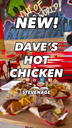 Enjoying sliders and tenders at Dave's Hot Chicken in Stevenage, featuring the spicy Reaper for an unforgettable experience!