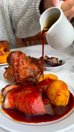 Cozy dining at The Swine Bistro in Leeds, showcasing local ingredients and delicious Sunday roasts.