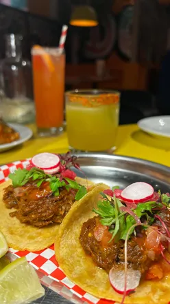Delicious tacos and infused drinks at Homies on Donkeys, Leytonstone, featuring Chef Erik Bautista's creations.